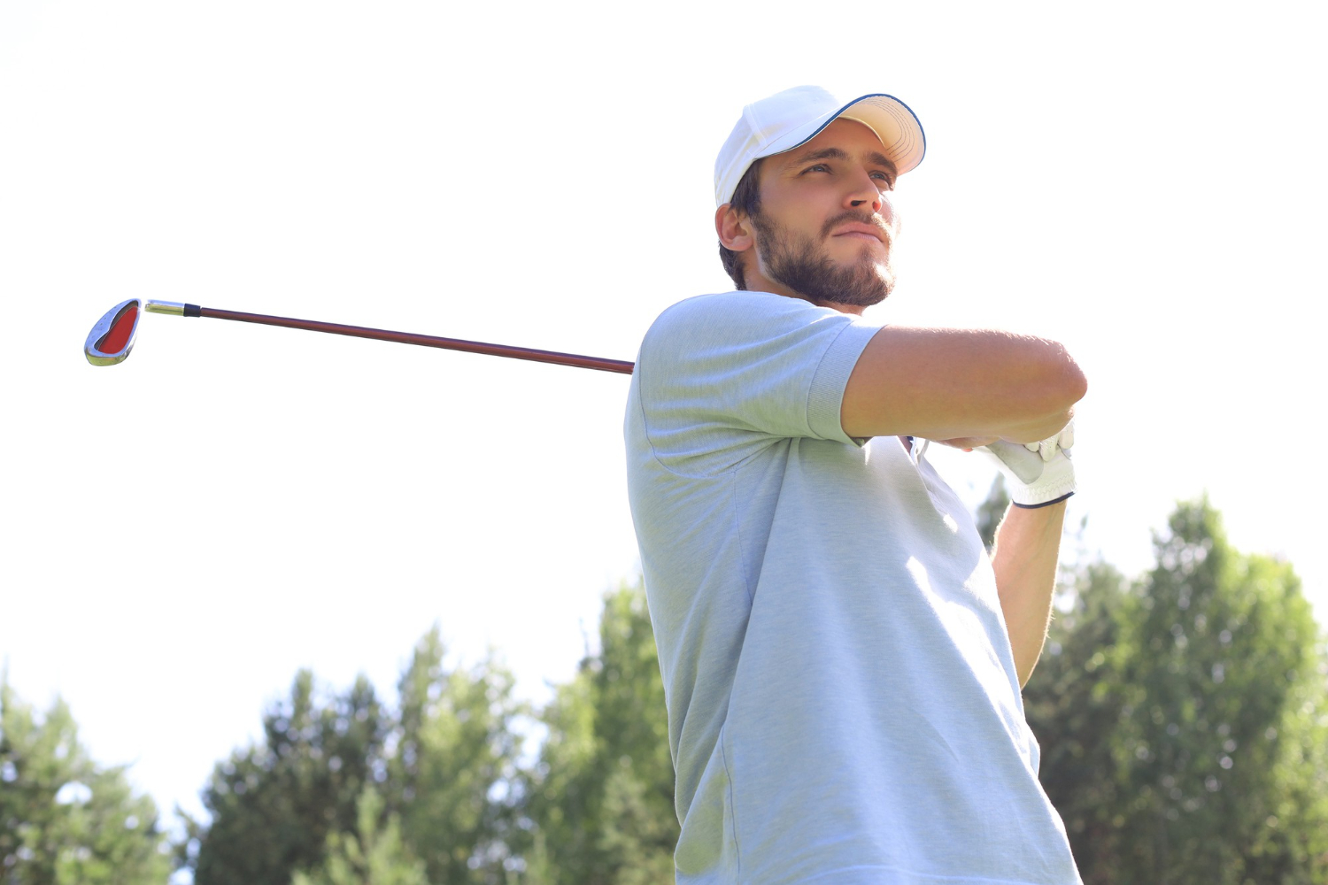 senior golfer testing lighter shaft options